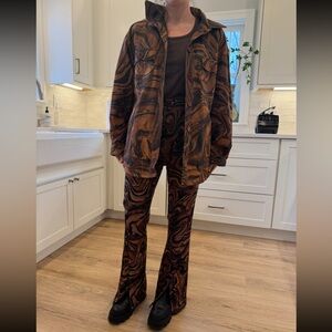 House of Sunny Mahogany Paradise flare pants with a brown swirl marble print
